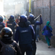 Police chase garments workers who have been protesting for higher wages at Ashulia, outskirt of Dhaka, Bangladesh, January 14, 2019. REUTERS/Mohammad Ponir Hossain - RC1FA8893A40